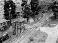 Ashwood Dale East signal box with the level crossing gate in operation.   Paul Plowman  Ashwood Dale East signal box with the level crossing gate in operation.   photo Paul Plowman