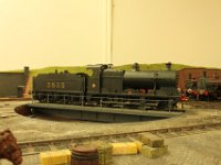 13.  Just enough room on the 50ft table for a MR Big Goods  The turntable is 50’ diameter, quite a common size in the early 1900’s.  The engine is 3835, the prototype of the 4F.  Known as the Big Goods when first built, the engine was initially class 3.  Deeley had proposed such an engine before his departure so I have assumed the engine was built 4 years earlier.  Unlike most of my engines this one has a Ragstone sprung chassis while the tender has split axles with sprung beam suspension.