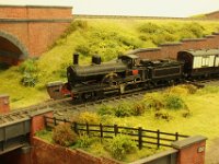19. Webb Teutonic class Pacific on a local passenger train to Ashworth  An LNWR semi fast from Leeds approaching New Sheppy Cut.  Like most of my LNWR stock the engine and coaches are from the estate of John Kennerley, a former BRMA member and very good modeller.  The engine is a Teutonic class Webb 3 cylinder compound, being a 2-2-2-0.  Built professionally it originally had a motor for each driving axle and had a top speed that would put a Porsche to shame.  It now has a single motor with chain drive to the second driving axle, and is a much reformed character.