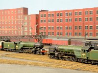 AH6  Thompson pacifics meet at the northern end of London Road. A2/2 60505" Thane of Fife" heads a Kings Cross-Newcastle working as A2/3 60511" Airborne" brings a southbound parcels train through the station. Both of these superb models were built from DJH kits.