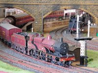 Photo A  LMS loco 1038 on a mixed traffic train departing Wellingford.